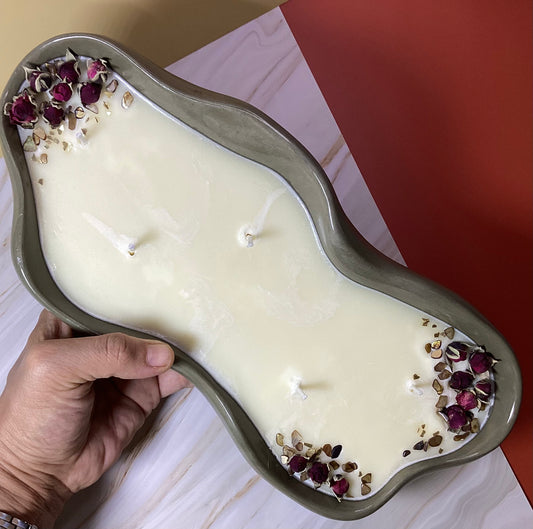 Vela XL aromática con diseño rústico color verde, aroma a rosas